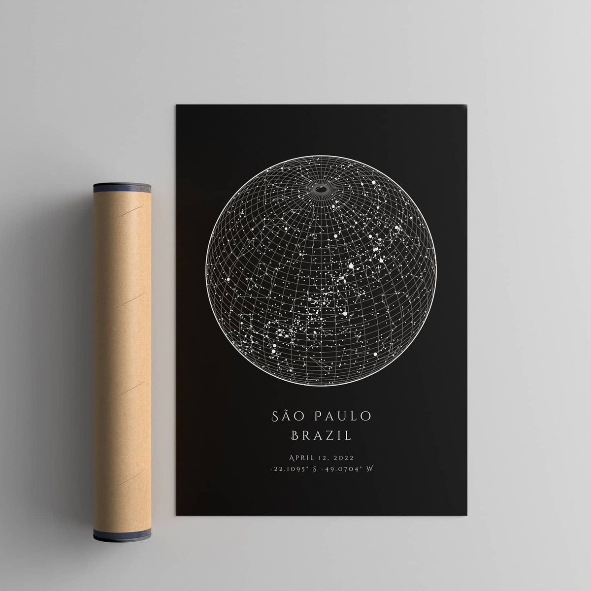 black circle star map print next to a poster tube