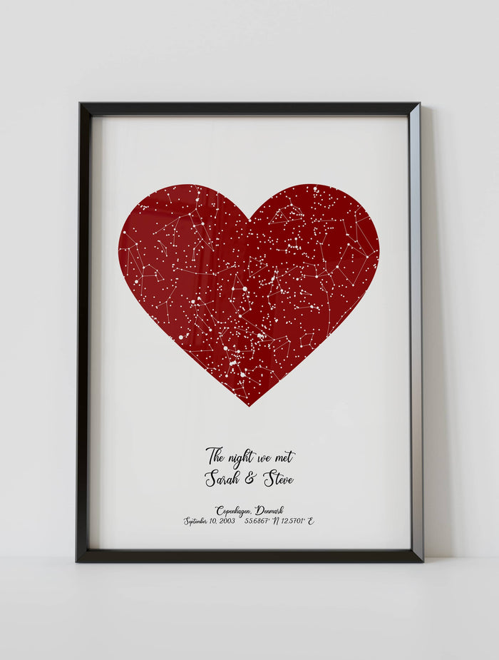 A framed star map poster featuring a specific date and location, customized with the quote "The night we met"