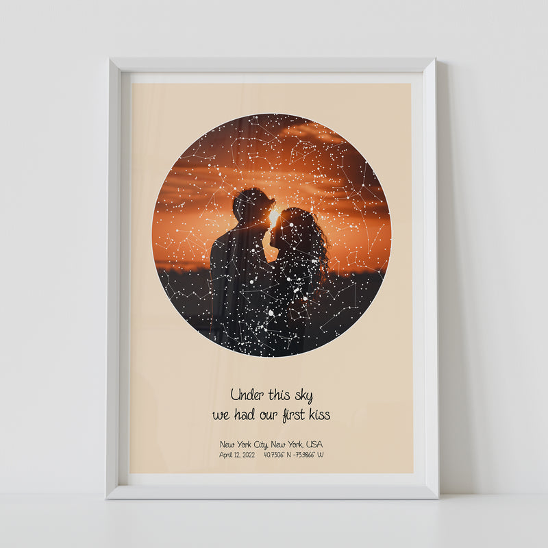 A framed constellation map poster, with a personalized quote "Under this sky we had our first kiss"