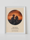 A framed star map with a photo featuring a specific date and location, customized with the quote "under this sky we had our first kiss"