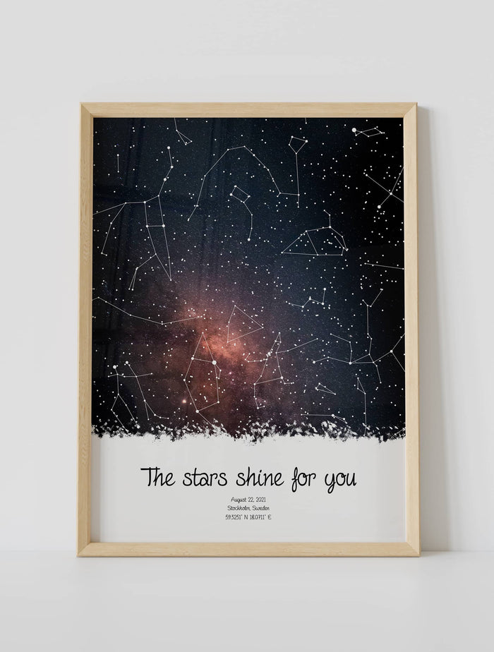 A framed custom star map poster featuring a specific date and location, customized with the quote "The Stars shine for you"