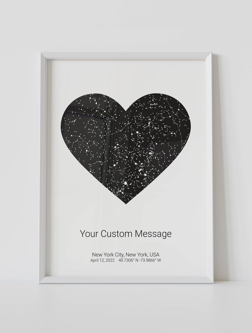 A framed heart star map poster featuring a specific date and location, with a personalized quote