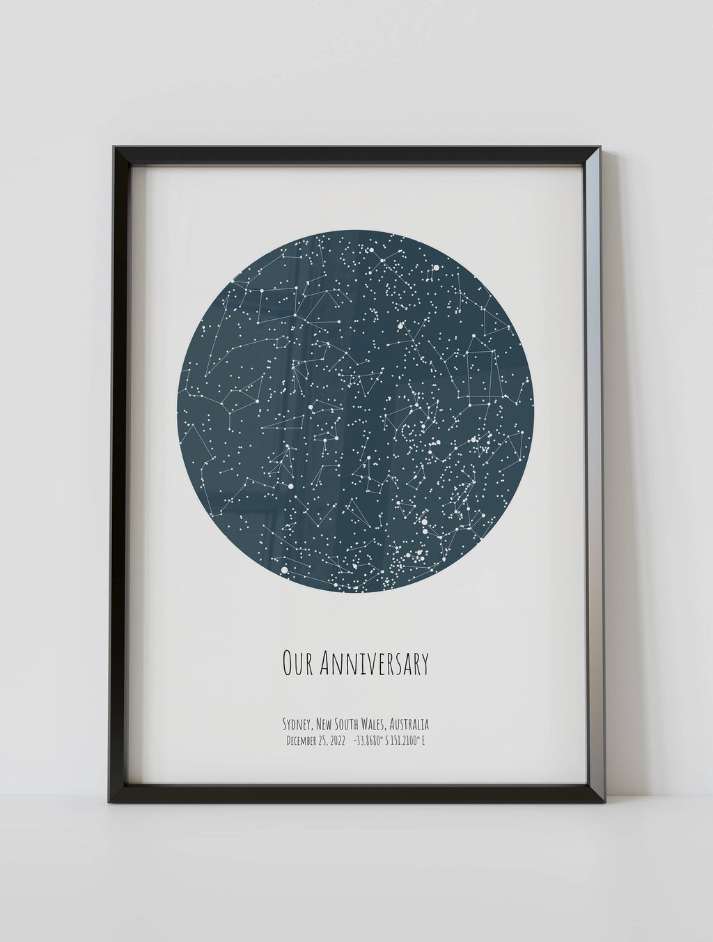 A framed star map poster featuring a specific date and location, customized with the quote "Our anniversary "