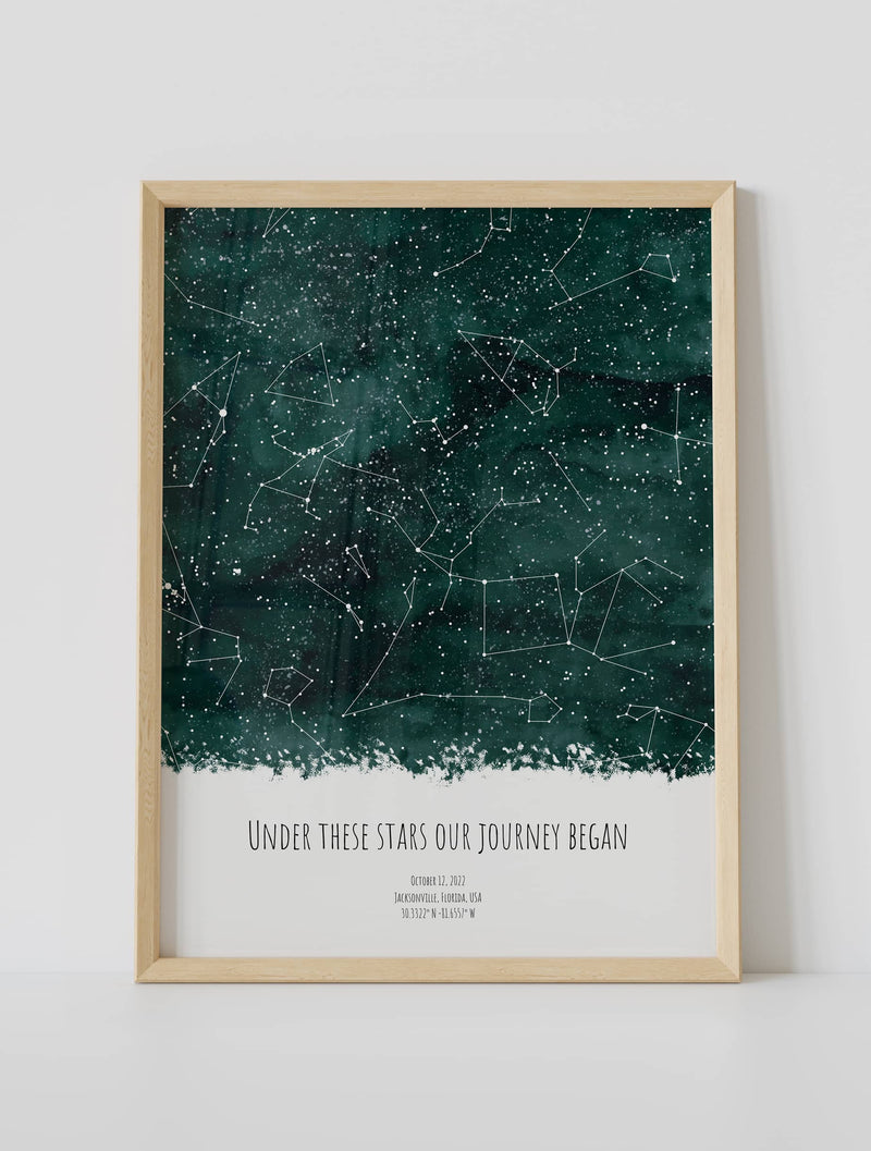 A framed star map featuring a specific date and location, customized with the quote "Under these stars Our journey began"