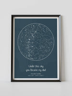 A framed custom star map poster featuring a specific date and location, customized with the quote "Under this sky you became my dad"