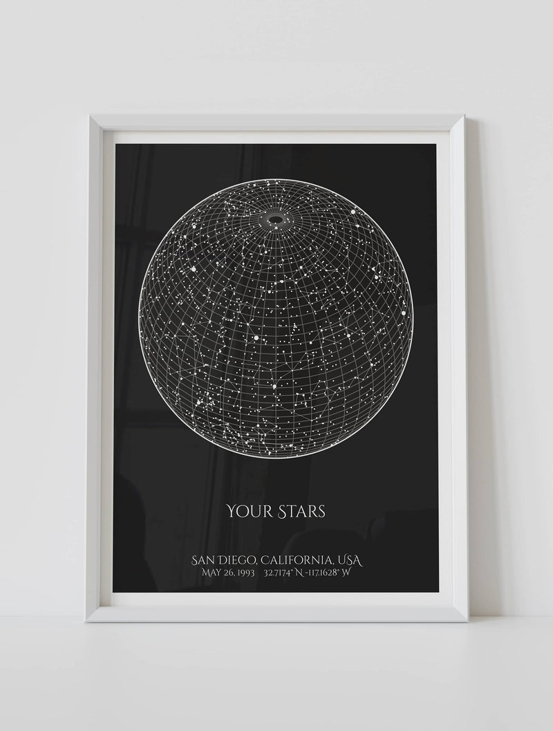A framed custom star map poster featuring a specific date and location, customized with the quote "Your stars"
