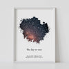 A framed constellation map poster, with a personalized quote "The day we met"